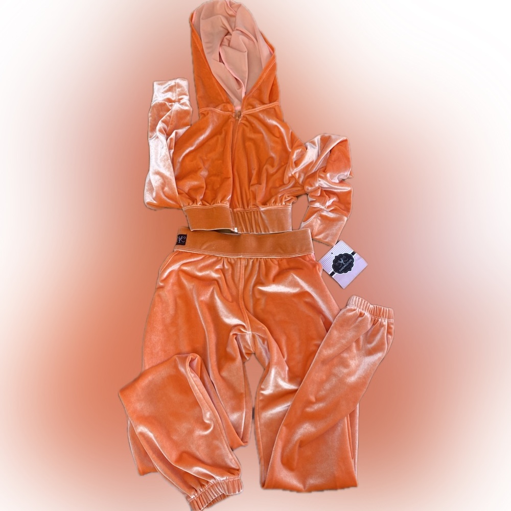 Kandi Kouture Dancewear Set new with tag
Bright orange velvet zip up with pant